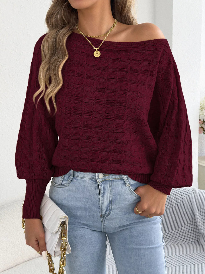 Cable knit boat neck sweater with dolman sleeves