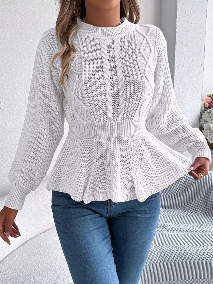Cable knit peplum sweater with mock neck