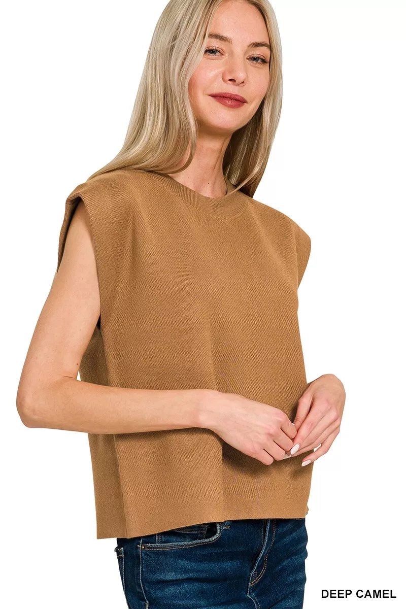 Boxy knit sweater vest with round neck and extended shoulders