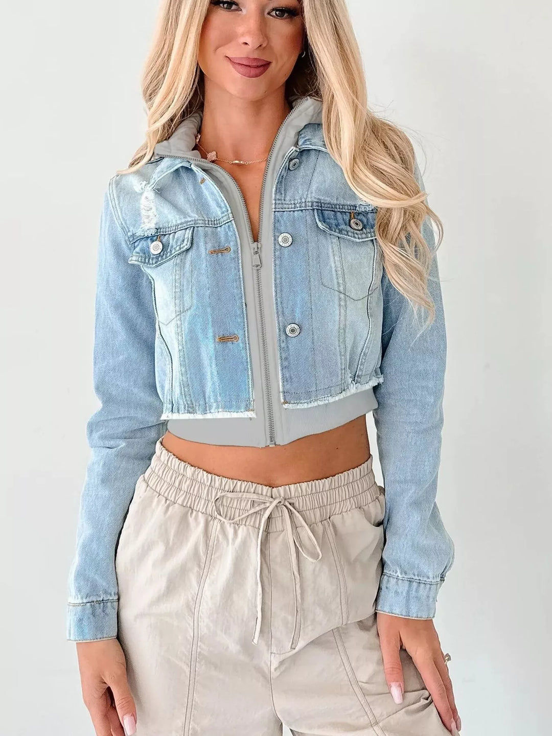Distressed cropped hooded denim jacket with zip front