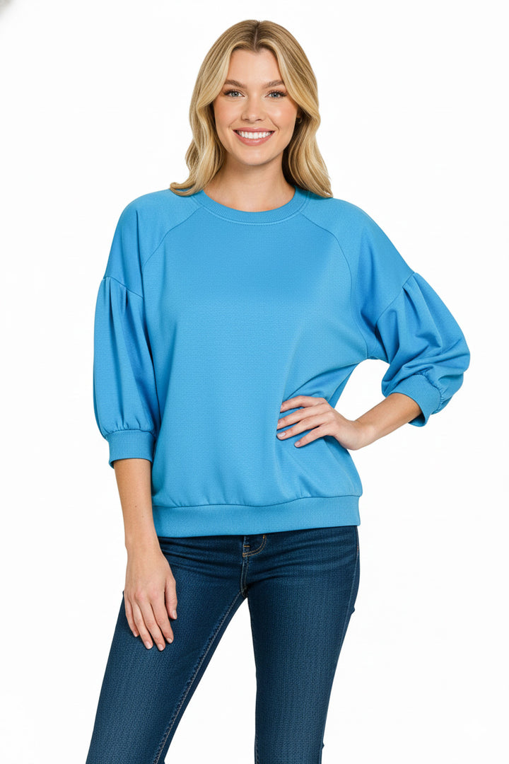 Dolman sleeve scuba sweatshirt with ribbed hem