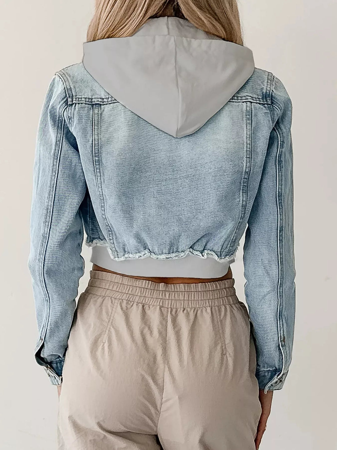 Distressed cropped hooded denim jacket with zip front