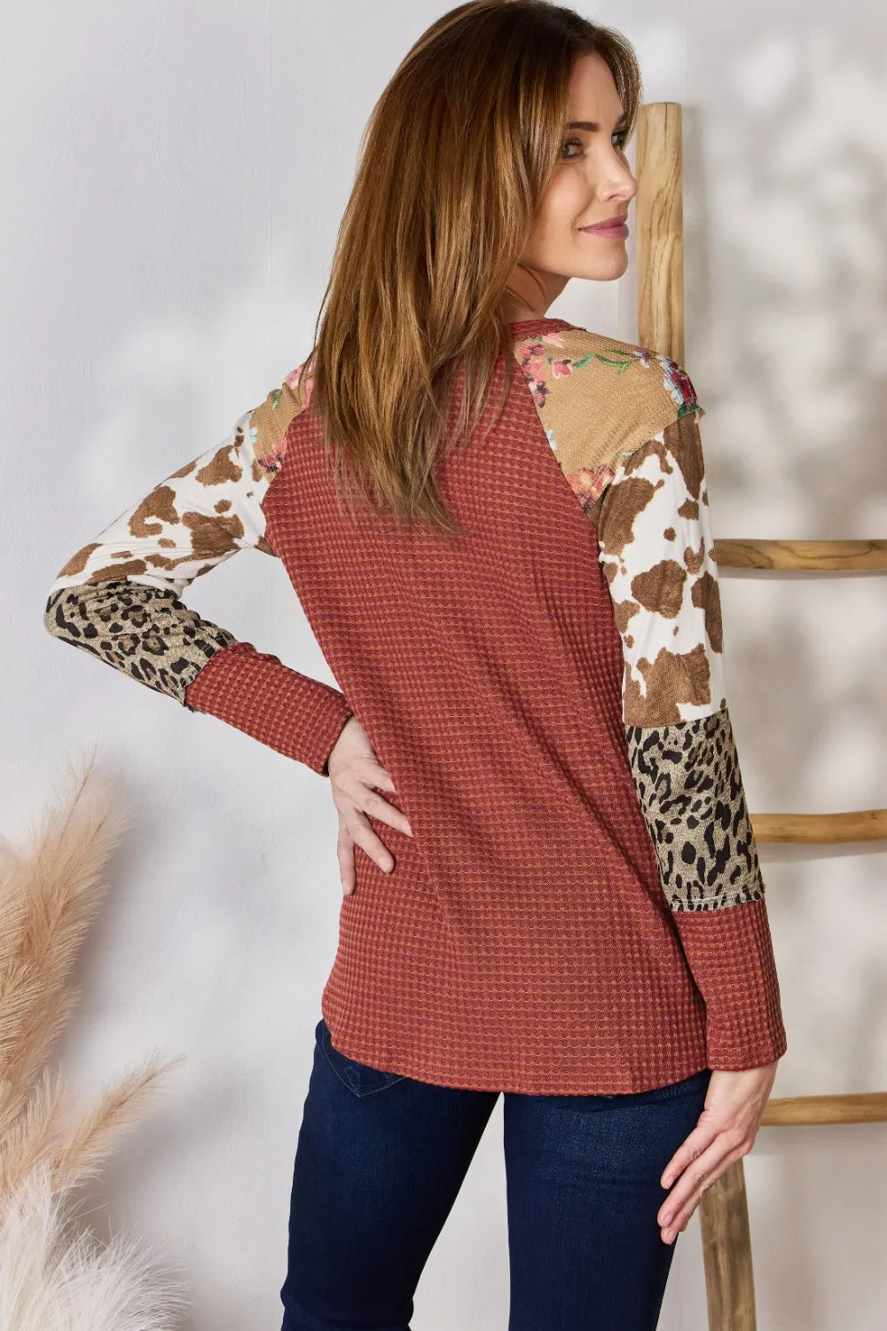 Waffle-knit top with leopard and floral print sleeves