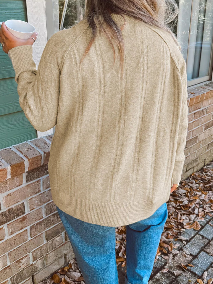 Oversized cable knit crew neck sweater with drop shoulders