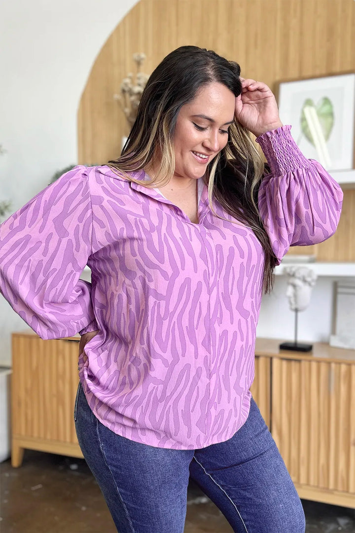 Zebra print smocked-cuff long sleeve blouse