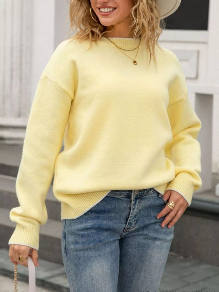 Bow-back knit sweater with ribbon ties and round neck