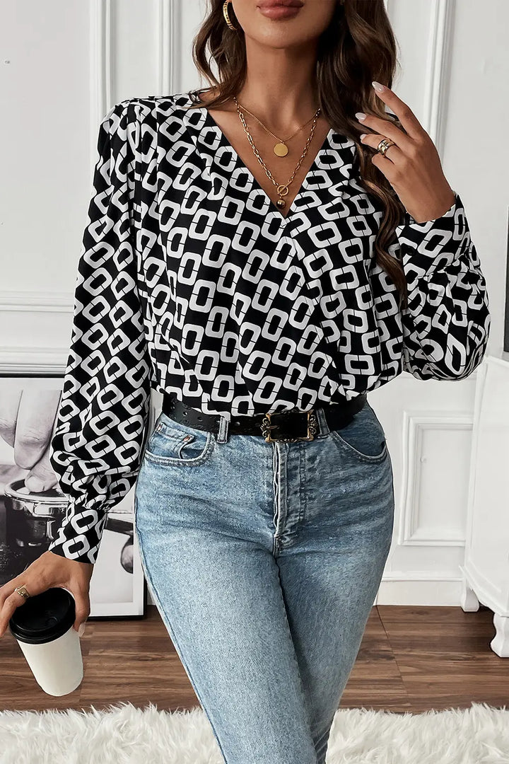 Geometric print wrap-front V-neck long sleeve blouse