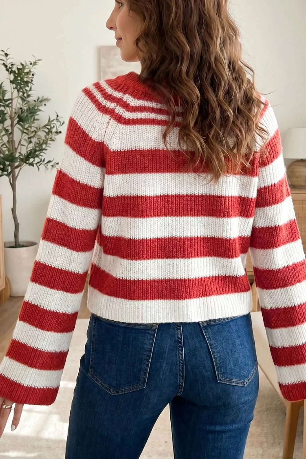 Striped rib knit henley sweater with snap button placket