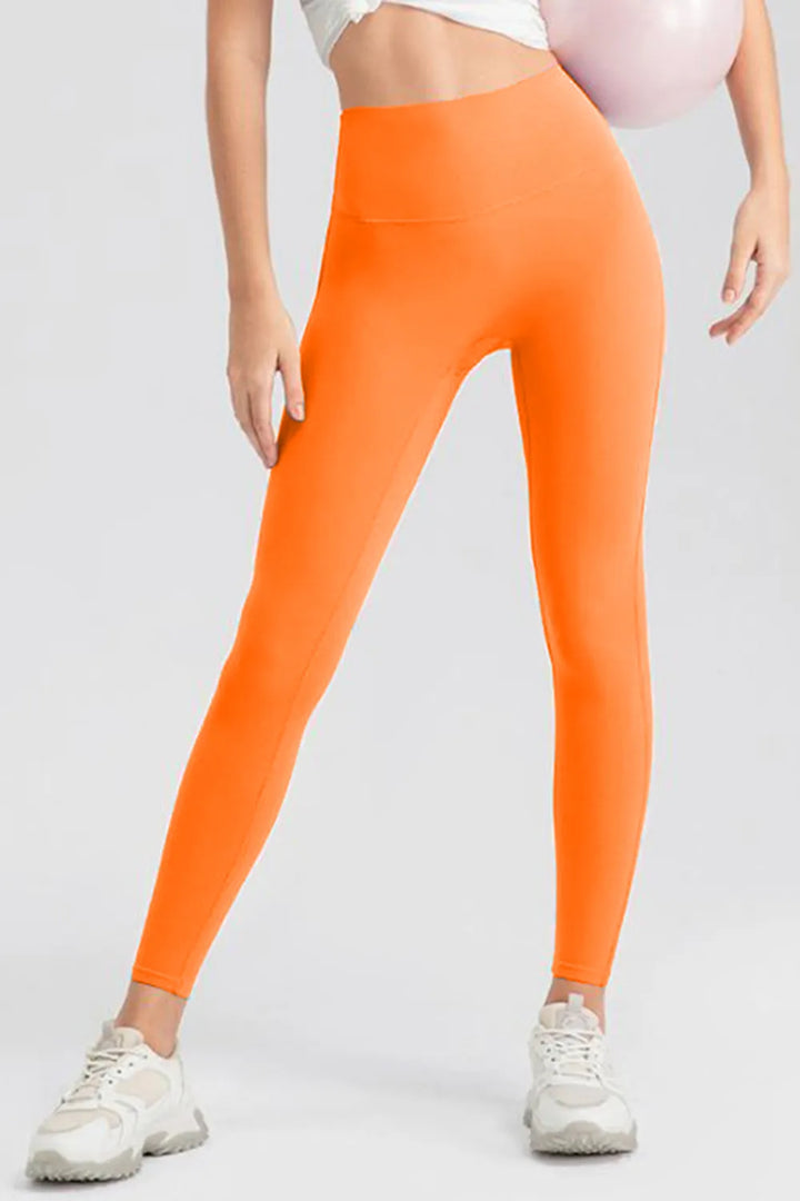 Orange High-waisted skinny active leggings with wide waistband