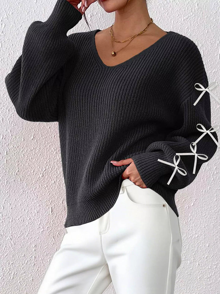 Ribbed knit V-neck sweater with bow-tie sleeves