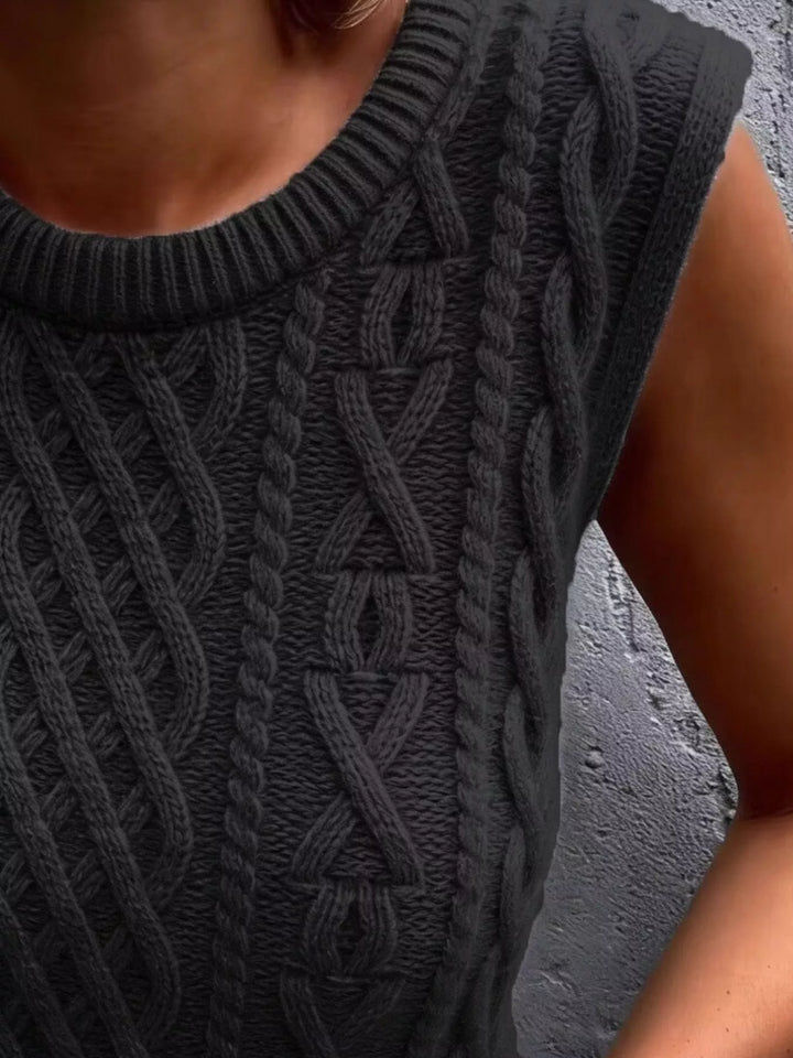 Cable knit sweater vest with ribbed crew neck