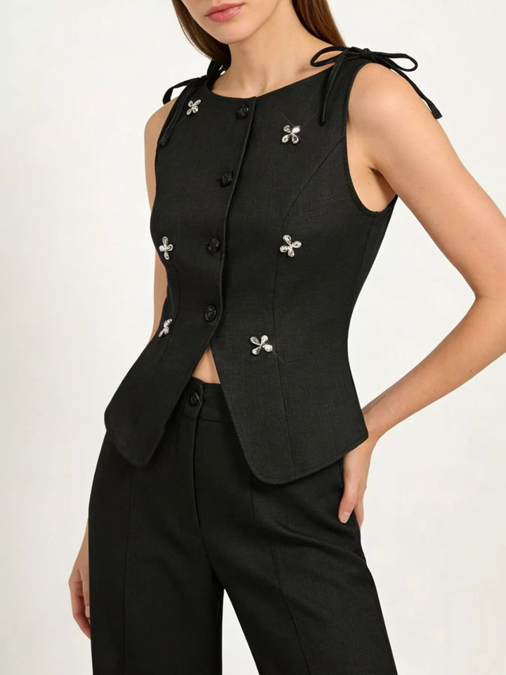 Black Structured button-front vest with rhinestone flower embellishments