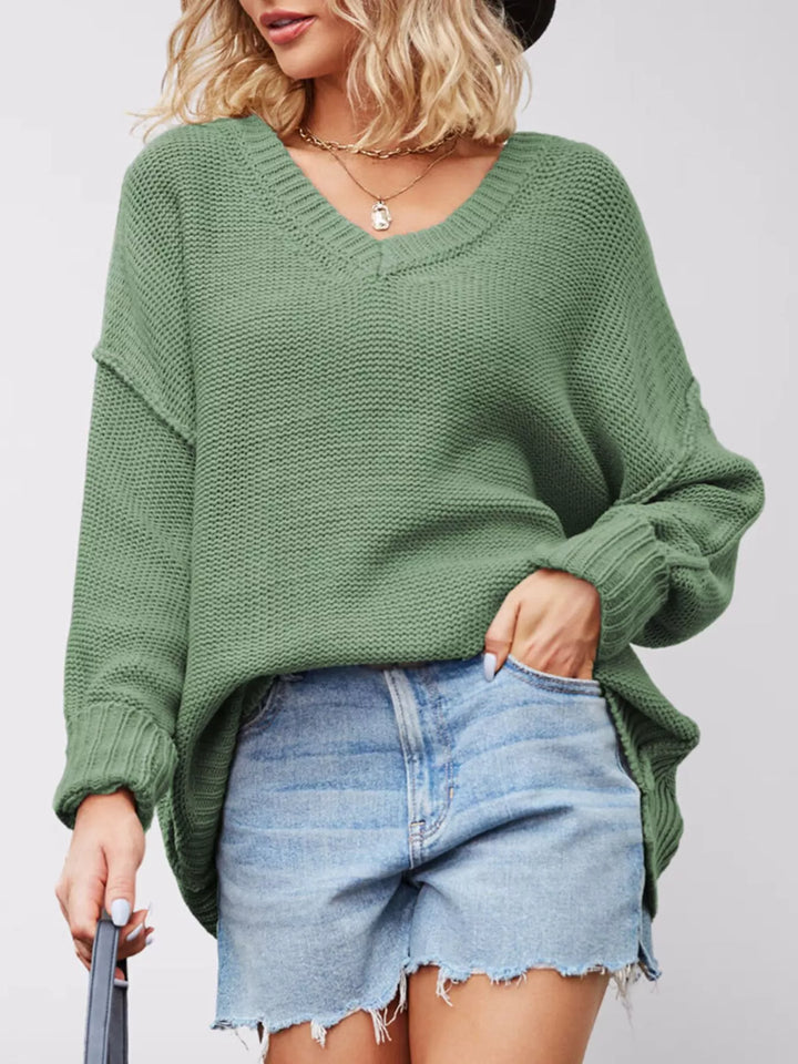 Drop shoulder V-neck sweater with exposed seams