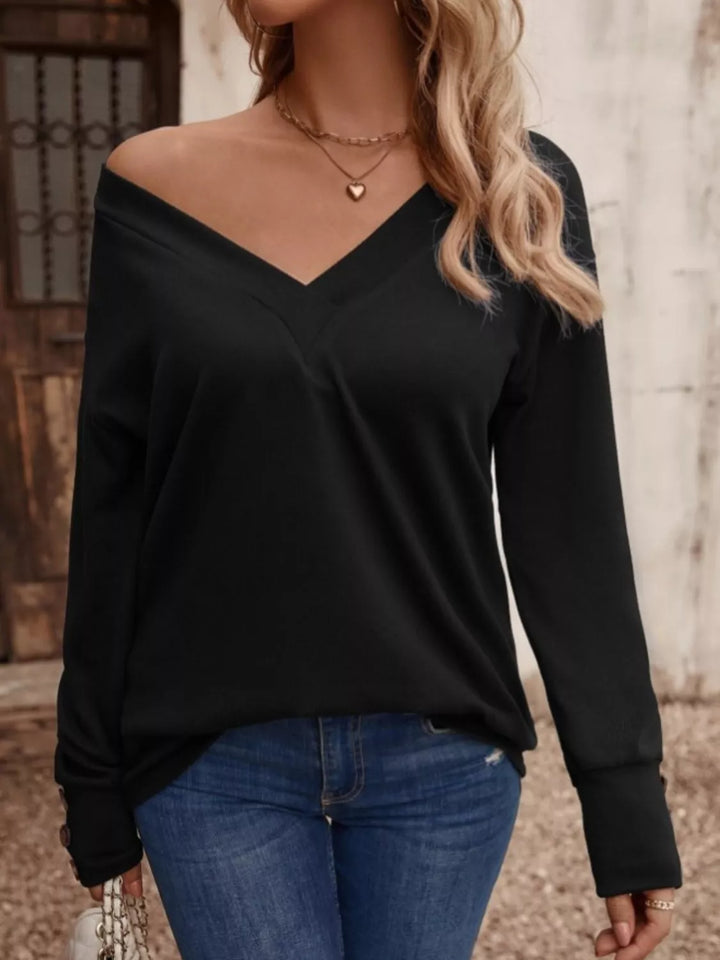 V-neck long sleeve top with button cuffs