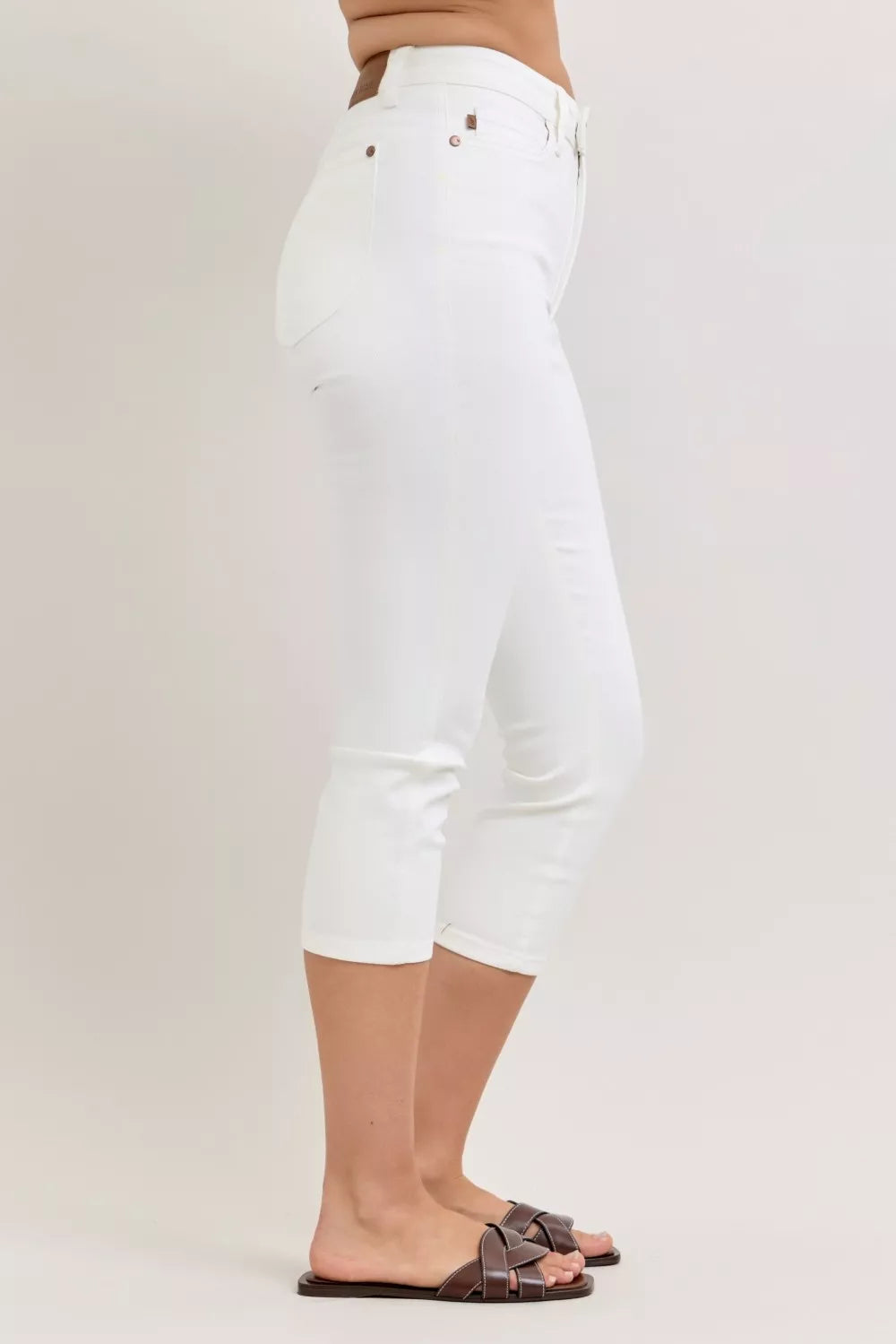 High-rise slim capri jeans with spade back pockets