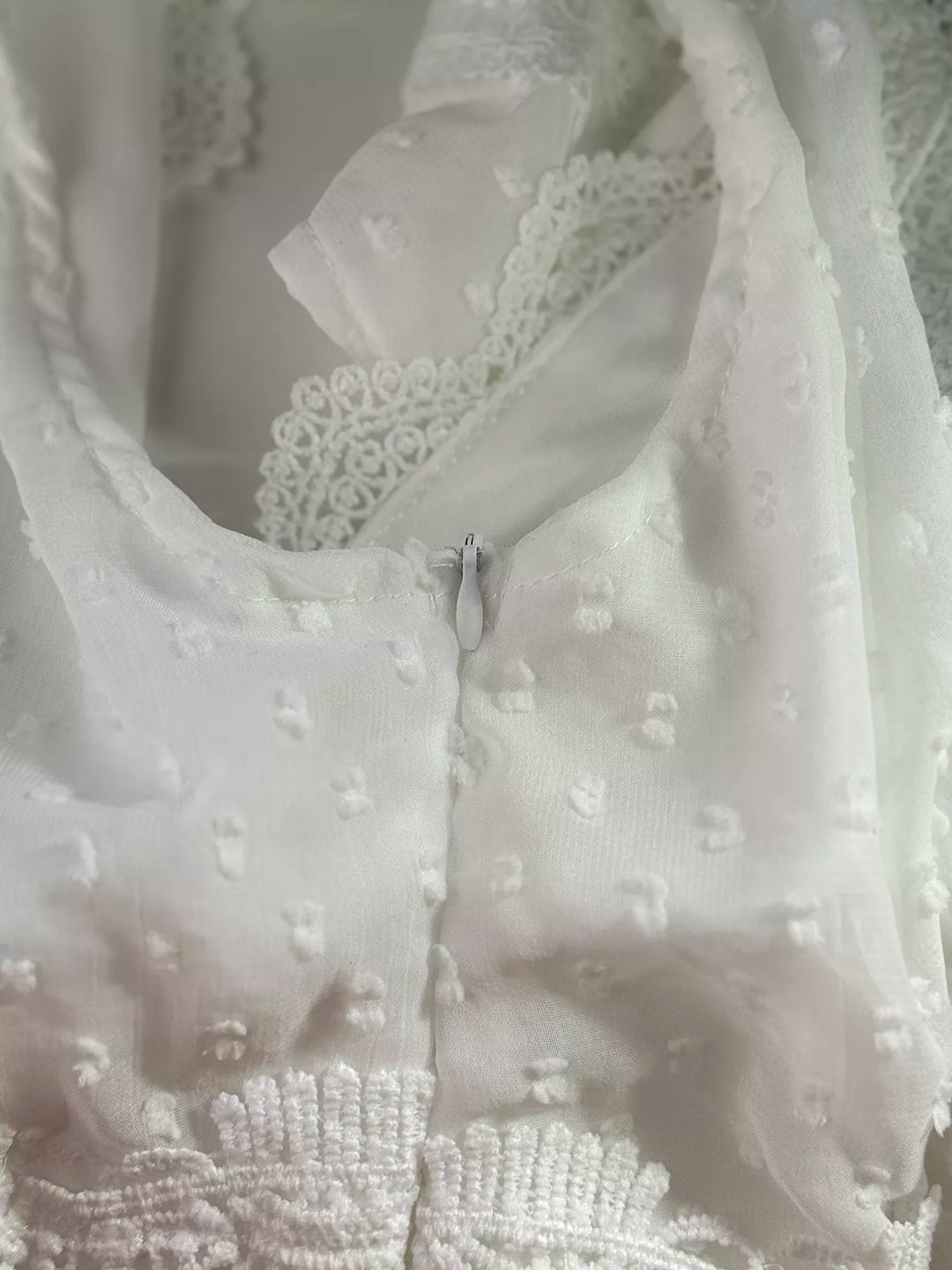 Sleeveless swiss dot tiered maxi dress with lace trim