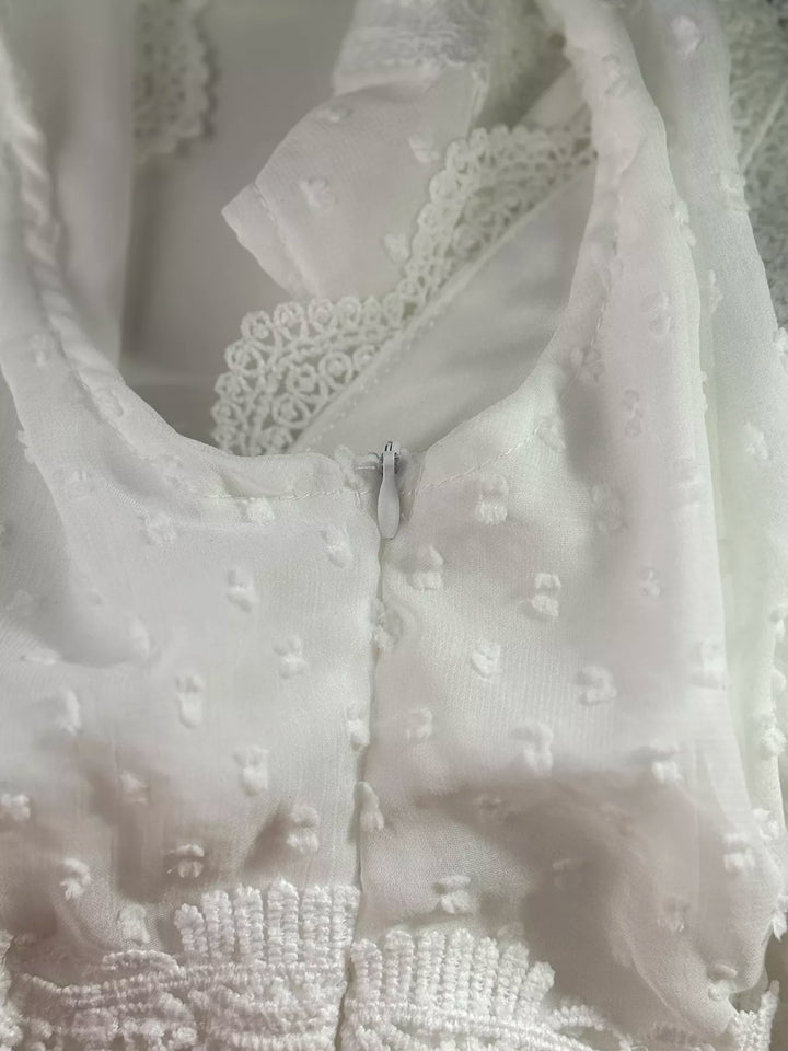 Sleeveless swiss dot tiered maxi dress with lace trim