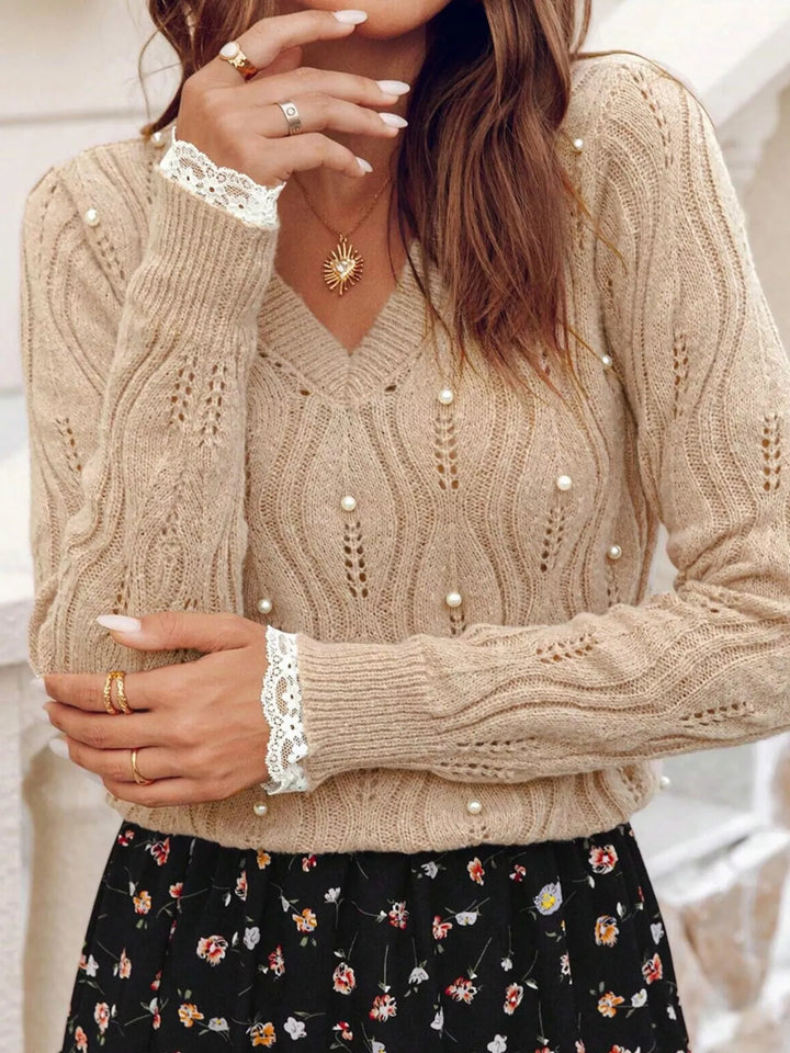Pearl-embellished pointelle knit V-neck sweater with lace cuffs