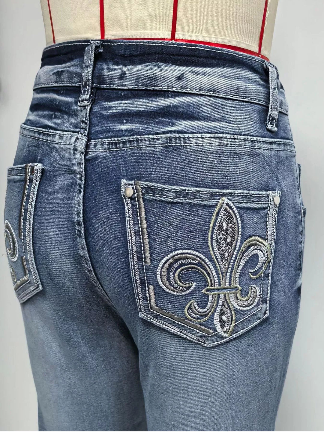 Faded high-rise flare jeans with double-button waist