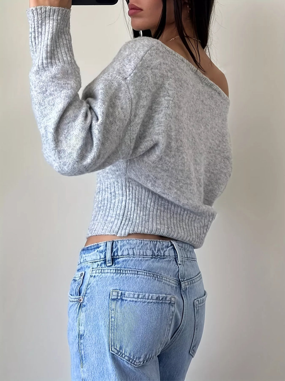 Boat neck cropped sweater with ribbed hem and long sleeves