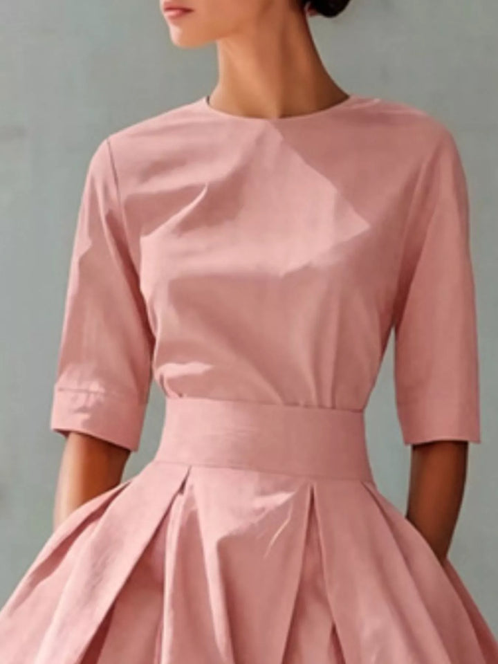 A-line pleated midi dress with side pockets