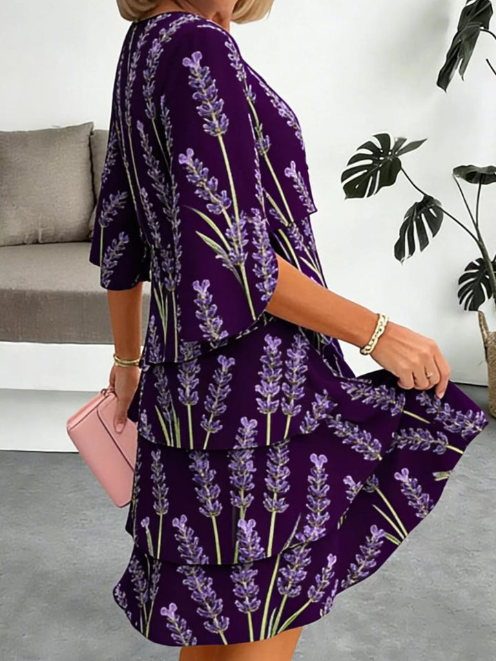 Tiered floral print midi dress with flutter sleeves
