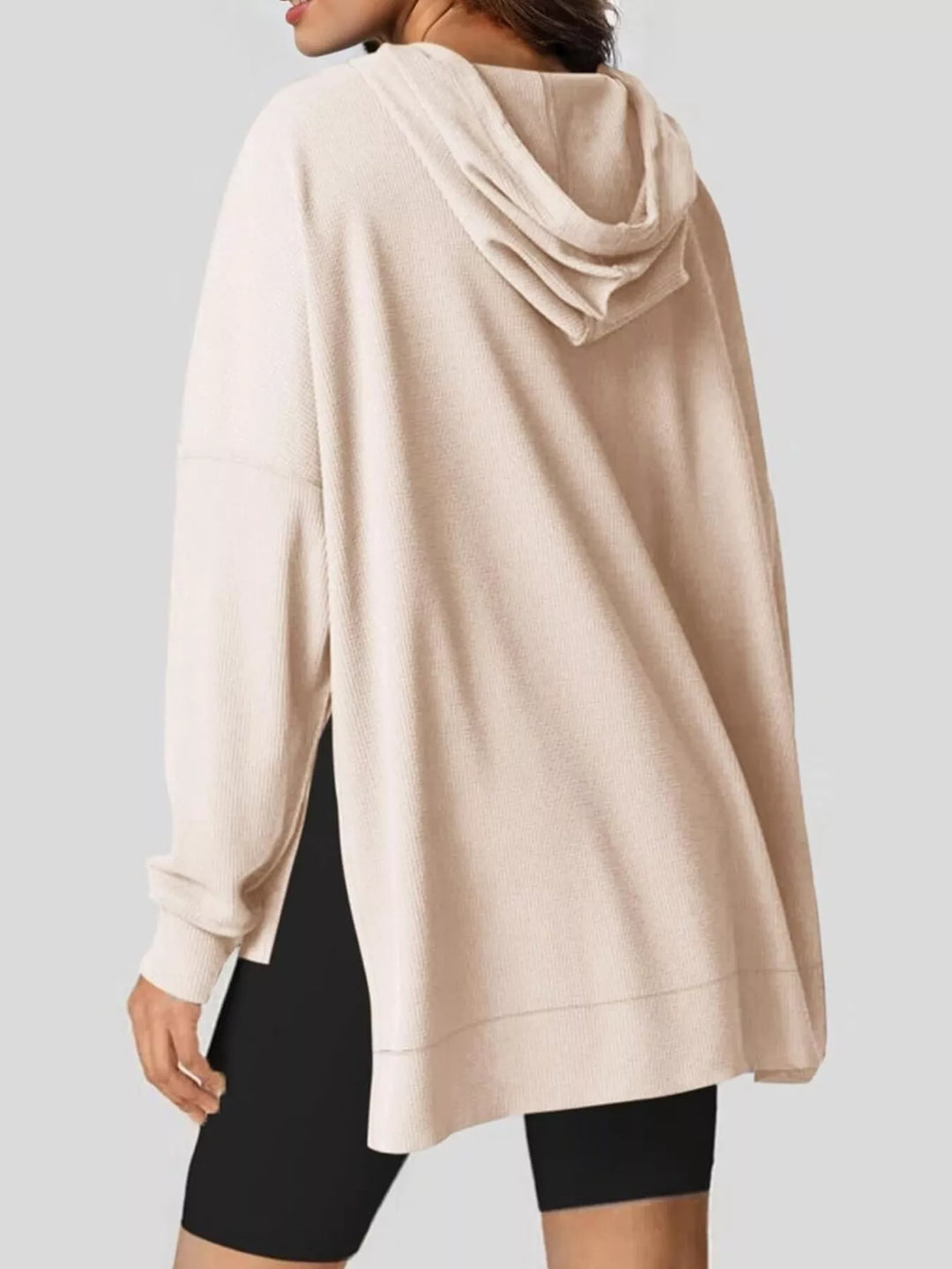 Oversized waffle-knit hoodie with side slits and front pocket