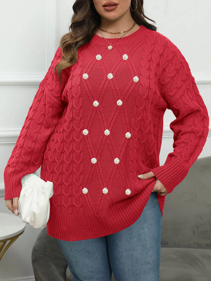 Cable knit dropped shoulder sweater with floral buttons