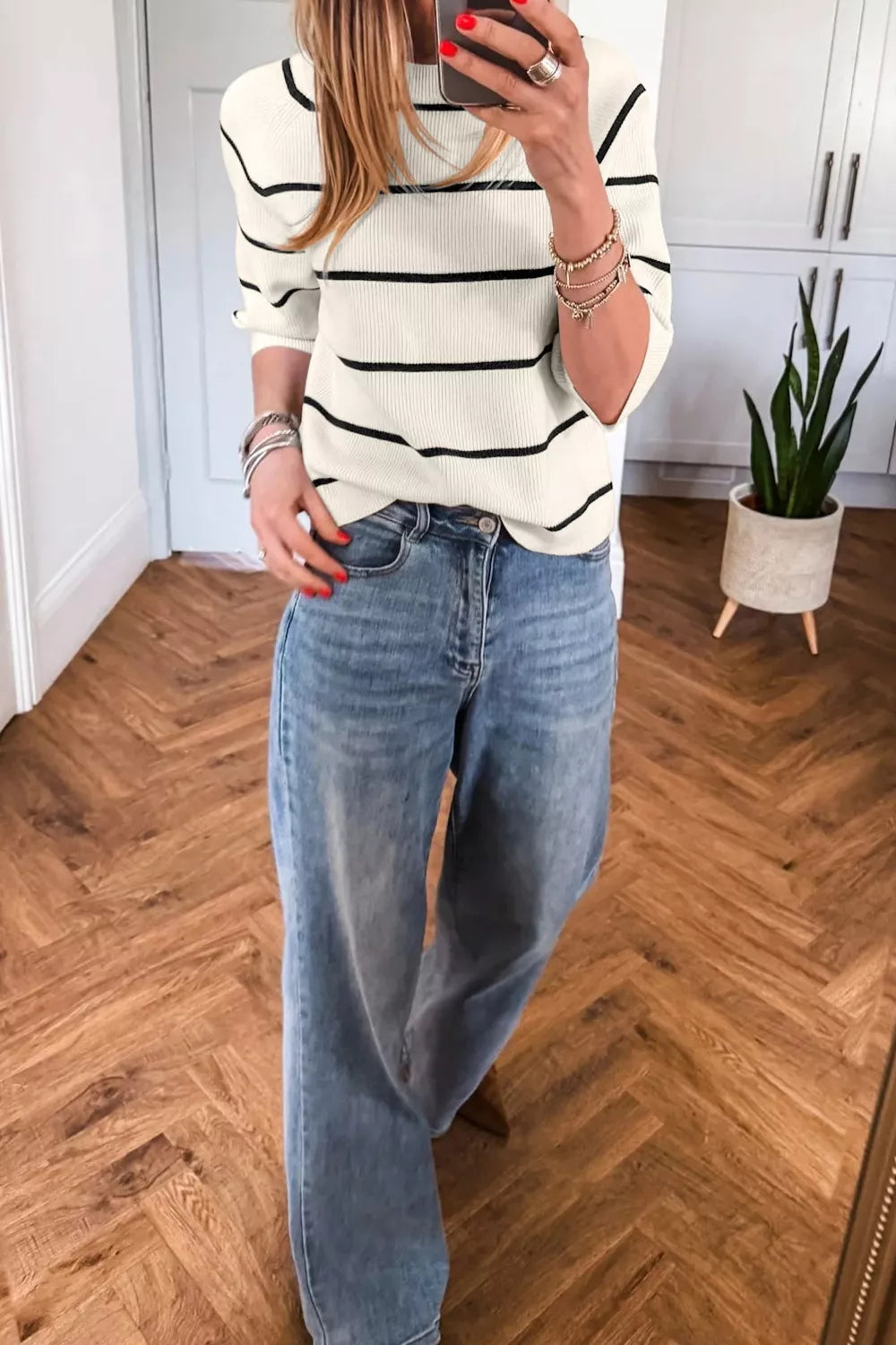 Striped ribbed knit pullover with three-quarter sleeves
