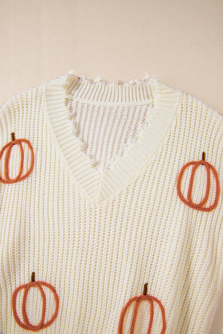 Pumpkin embroidered chunky knit sweater with frayed raw hem