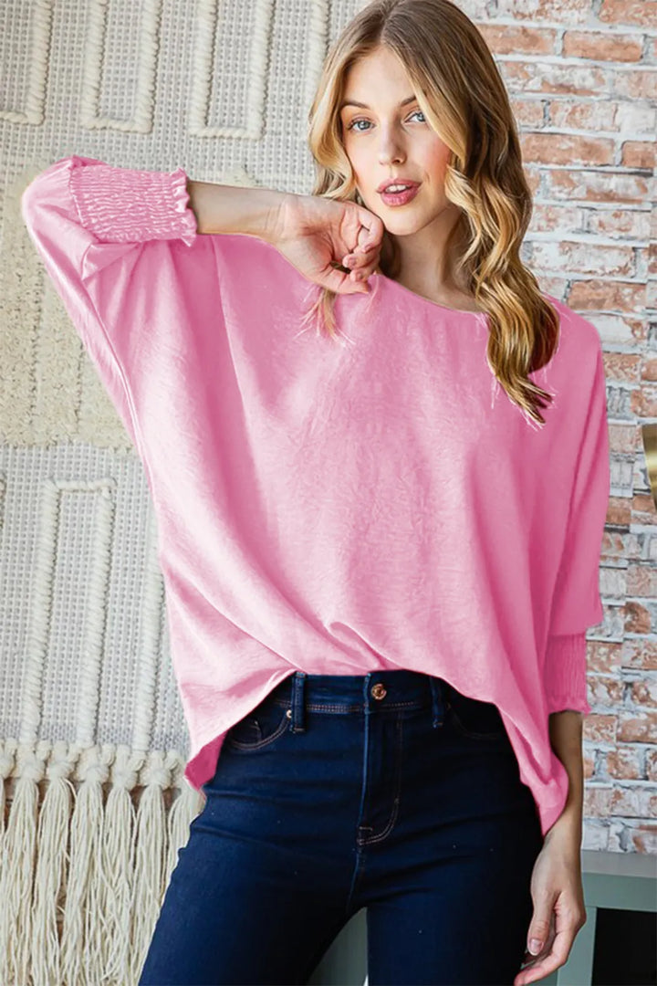 Textured round neck top with smocked half sleeves