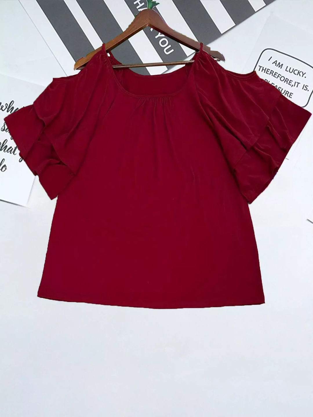 Cold shoulder top with tiered ruffle sleeves