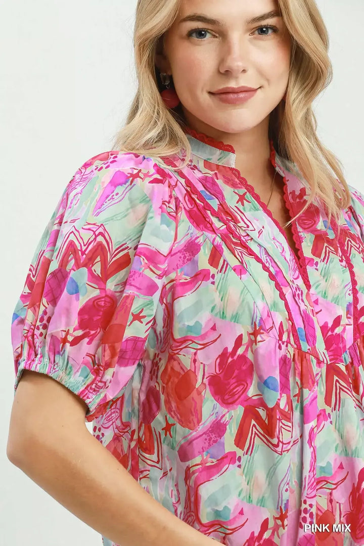 Abstract print puff sleeve top with ruched yoke
