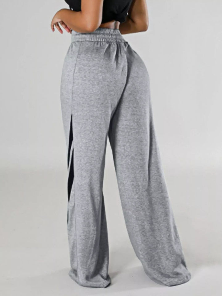 Plus size wide-leg pants with contrast side stripes
