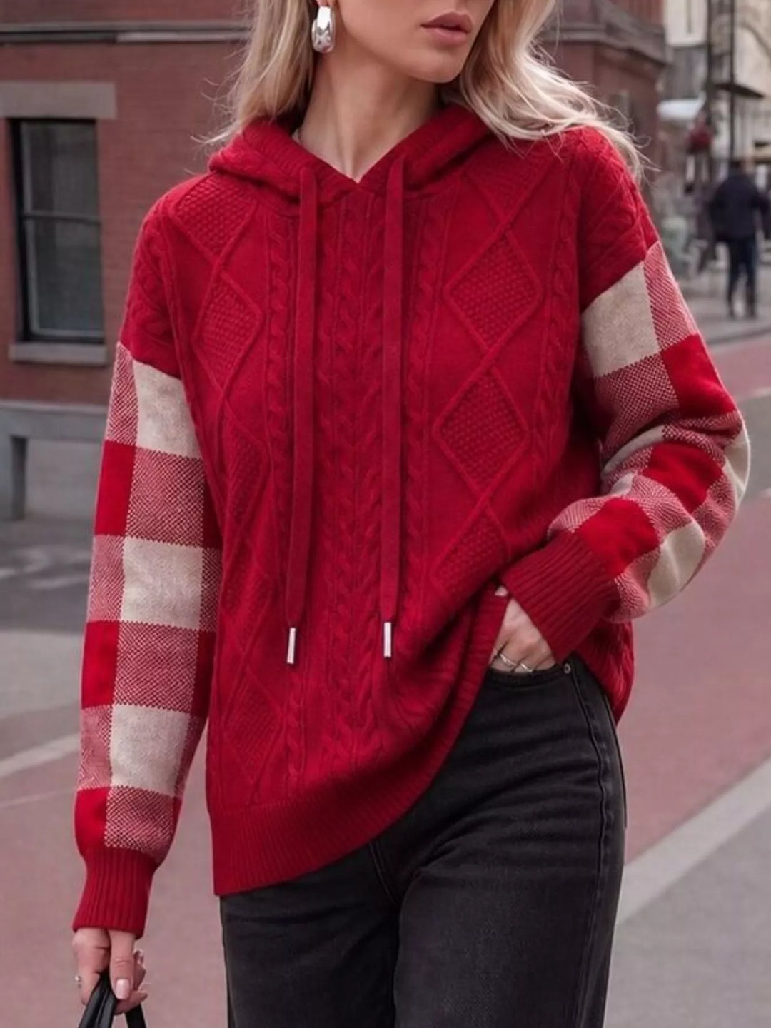 Red Cable knit hooded sweater with plaid sleeves and drawstring
