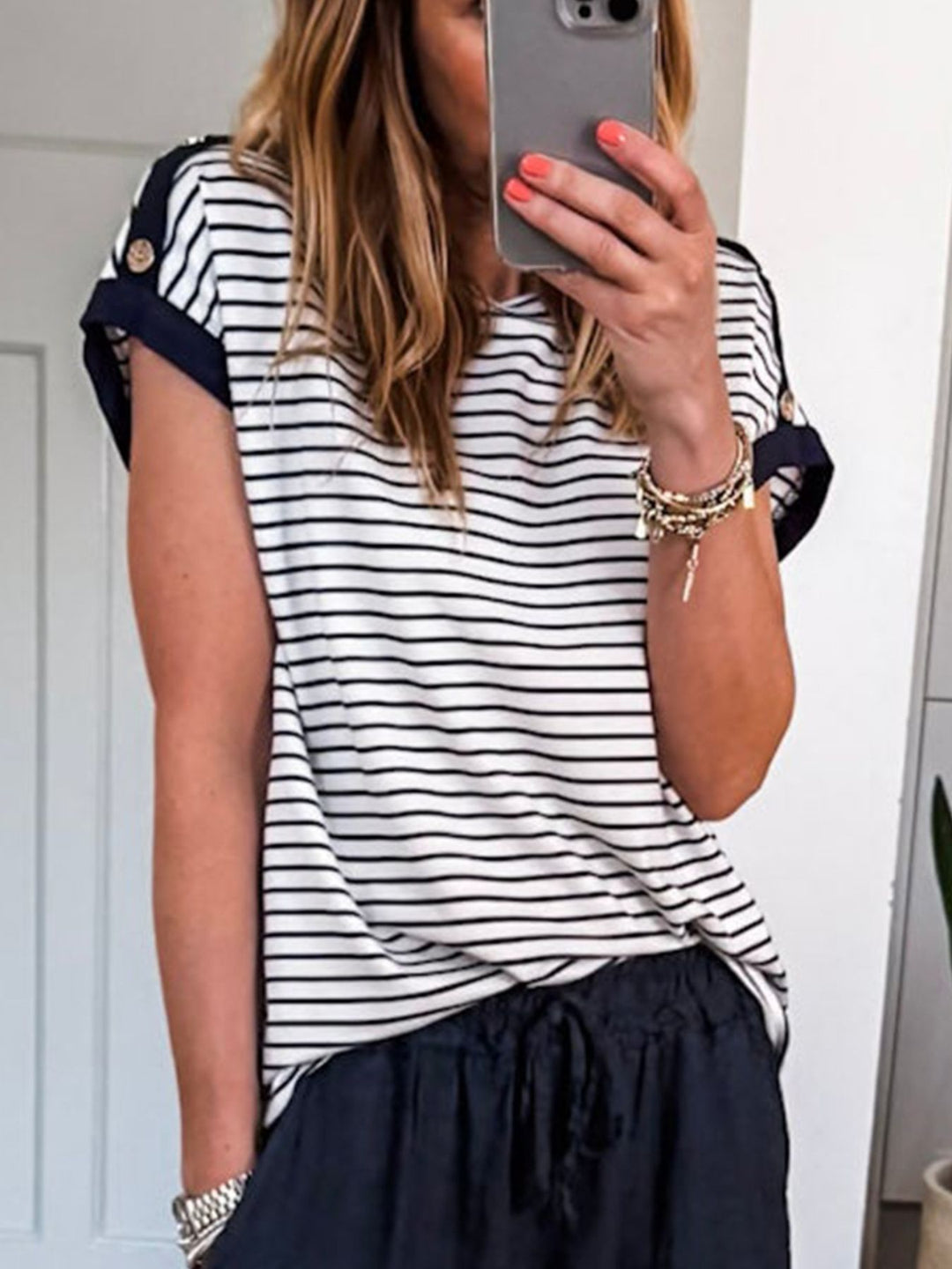 Striped short sleeve tee with button-trim cuffed sleeves