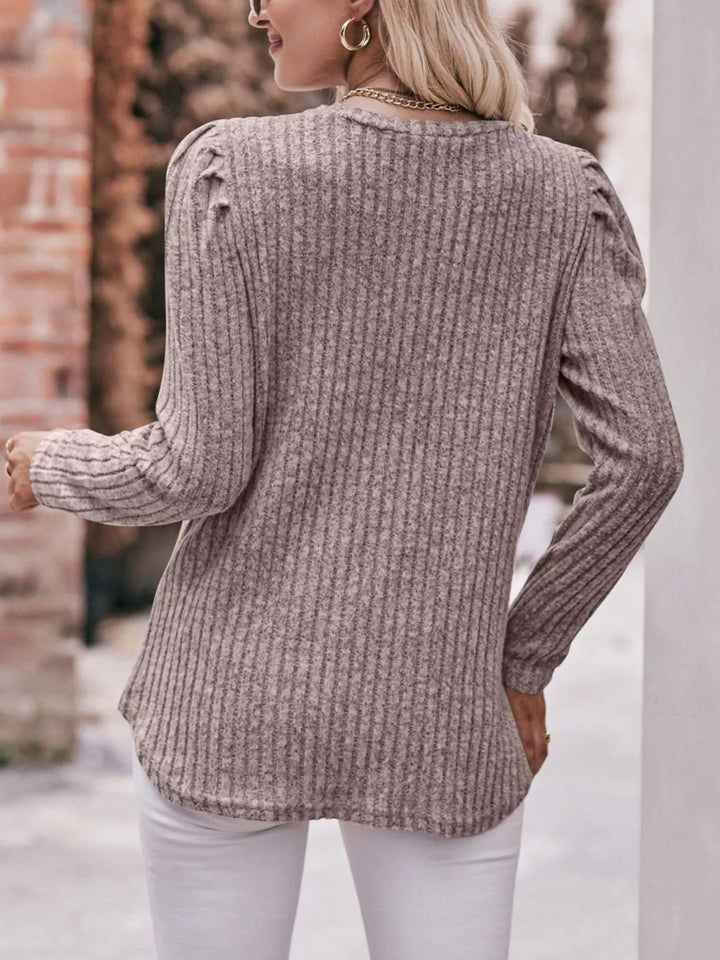 Ribbed knit long sleeve top with puff shoulders