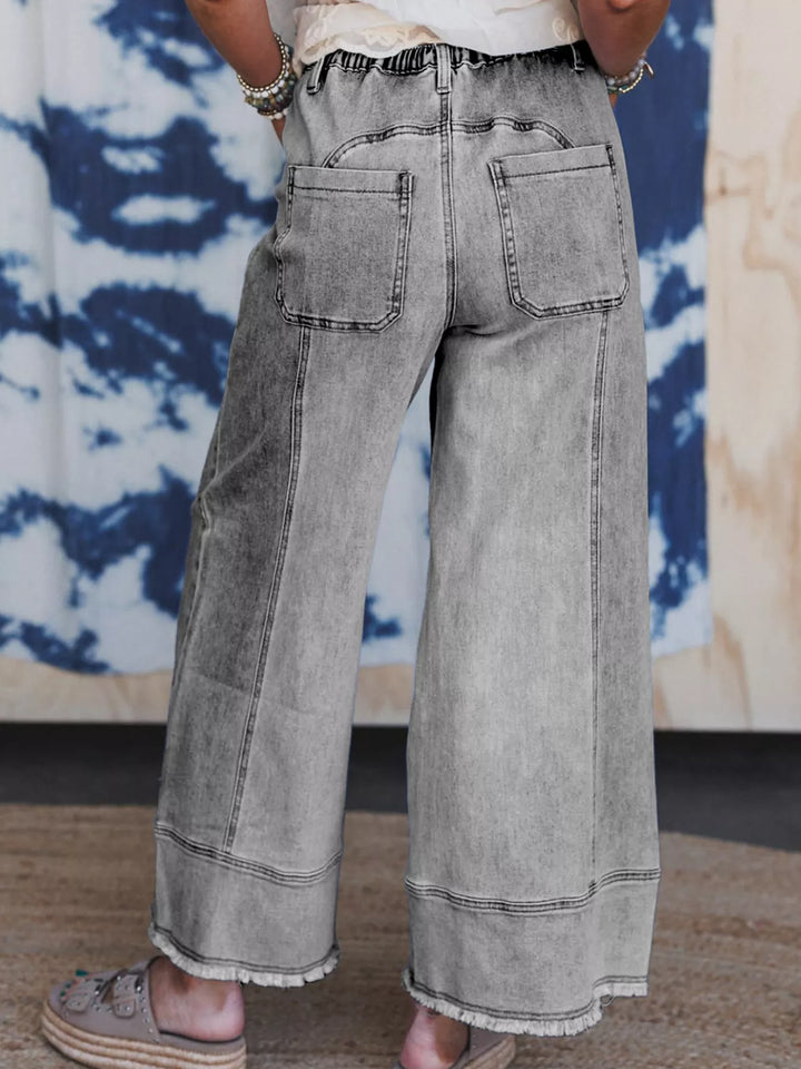 Wide-leg drawstring jeans with raw frayed hem