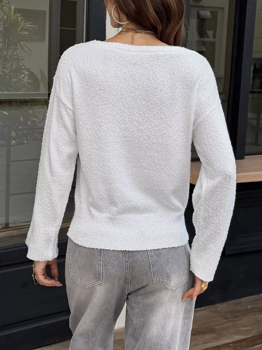 Textured boat neck dropped shoulder knit sweater