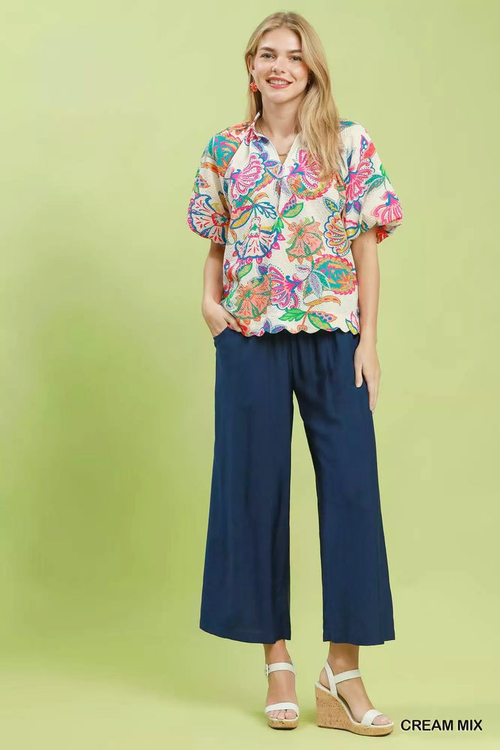 Textured floral print blouse with scalloped hem