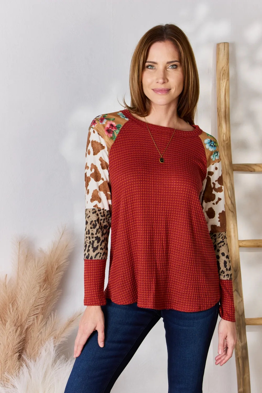 Waffle-knit top with leopard and floral print sleeves