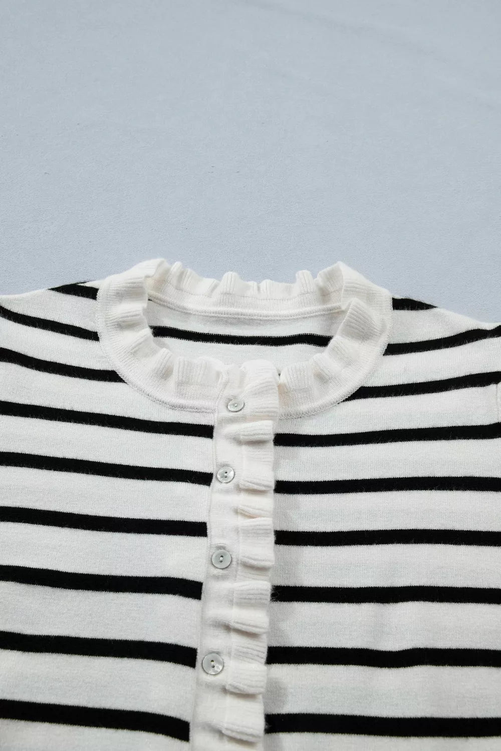 Striped short sleeve knit cardigan with ruffle trim
