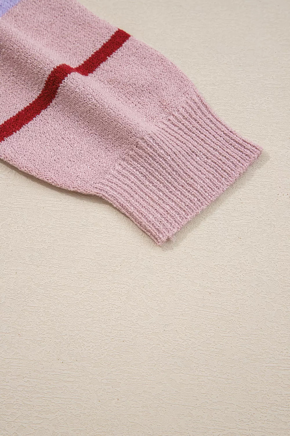 Striped drop-shoulder knit sweater with ribbed cuffs