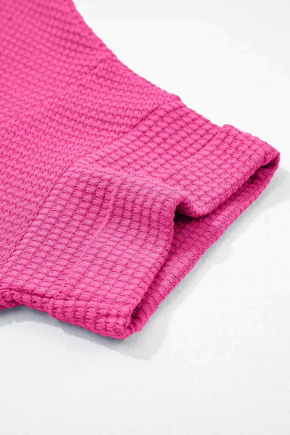 Waffle knit V-neck tee with cuffed short sleeves