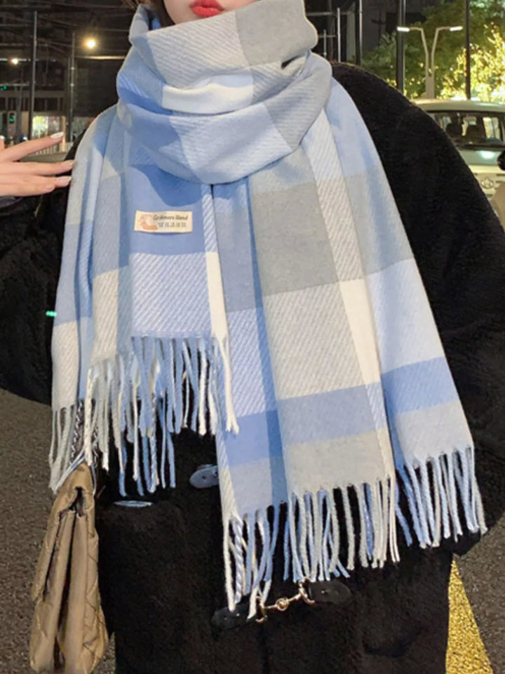 Oversized plaid wool scarf with fringe trim
