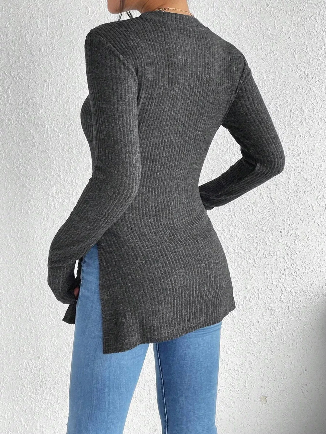Slit-hem ribbed knit long sleeve top with crew neck