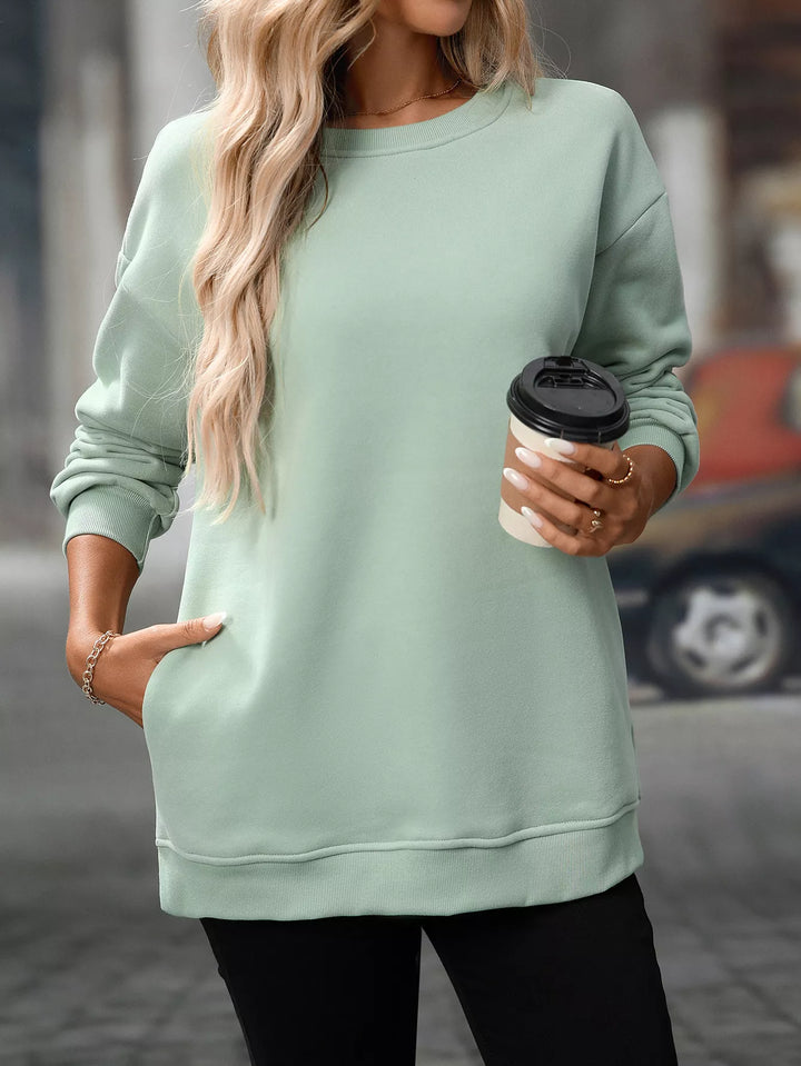 Gum Leaf Relaxed crew neck sweatshirt with side pockets and slit hem