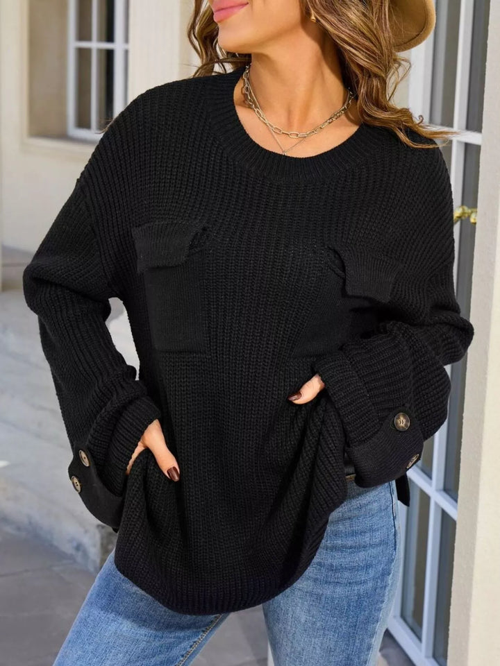 Black Ribbed knit sweater with chest pockets and button cuffs
