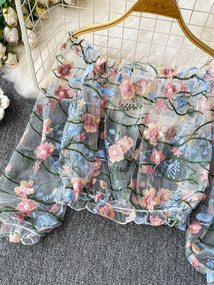 Floral embroidered off-shoulder mesh crop top with puff sleeves