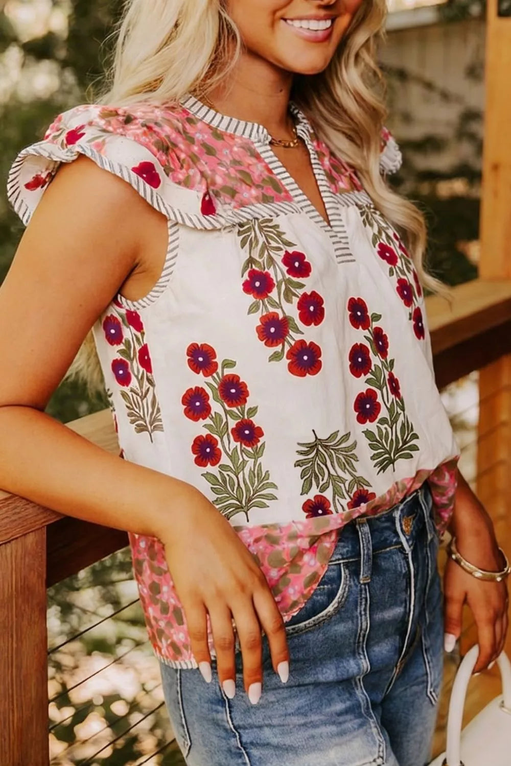 Floral print ruffle cap sleeve blouse with striped trim